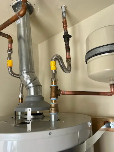 Water heater installation and plumbing repair in Sansom Park